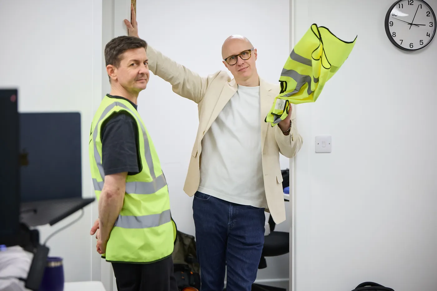 Handing over a hi-vis vest before heading onto the World Products fulfilment floor